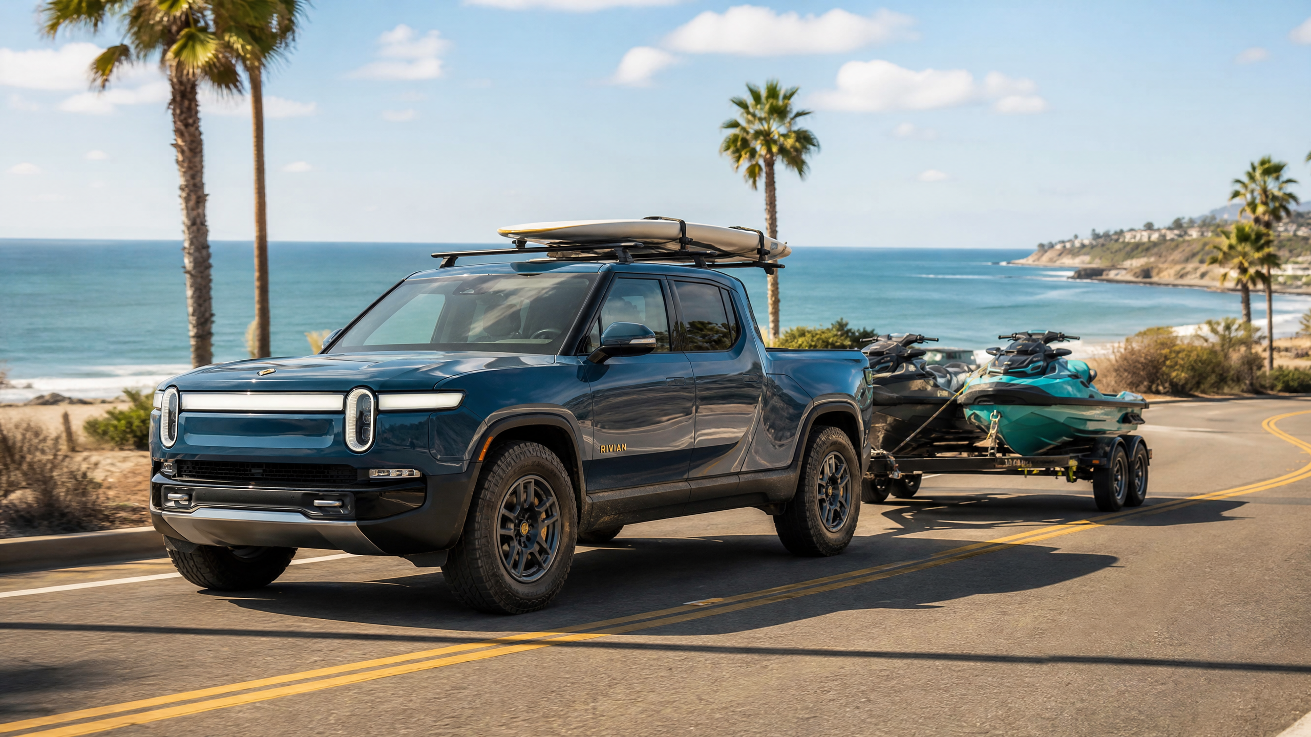Rivian R1T Towing Jet Skis - Rivian Blue Coastal